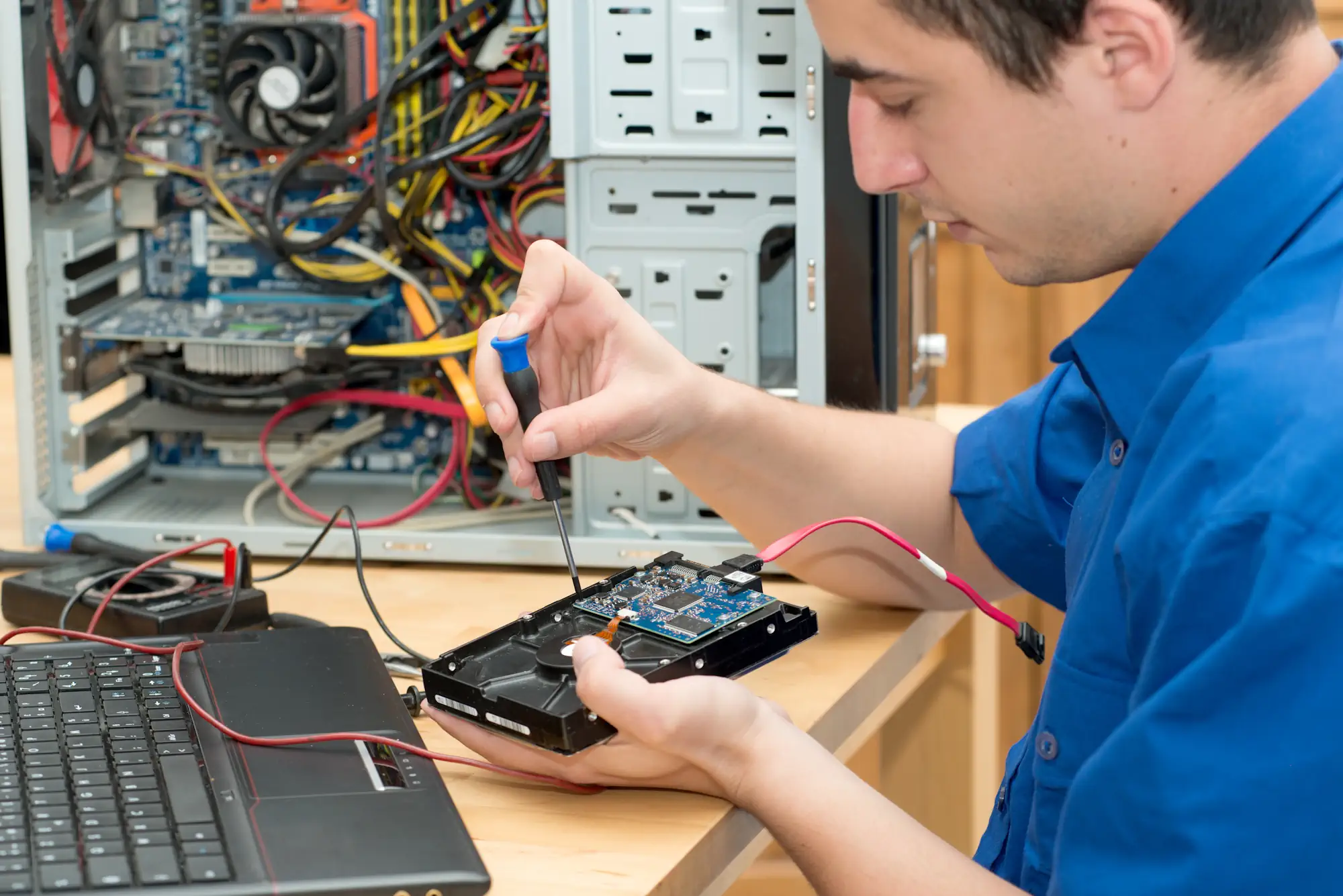 Young_Technician_Working_Broken_PC